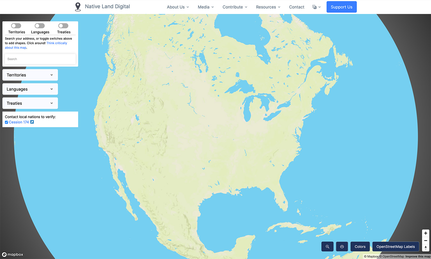 An interactive globe turned to have North America in view, with no borders on the website Native Land Digital